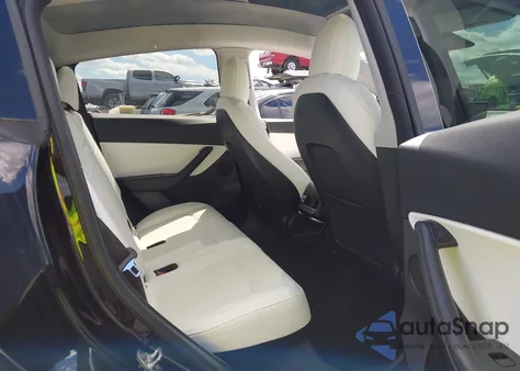 2021 Tesla Model Y Long Range Dual Motor All-Wheel Drive z USA, uszkodzony, nr VIN 5YJYGDEE2MF257923